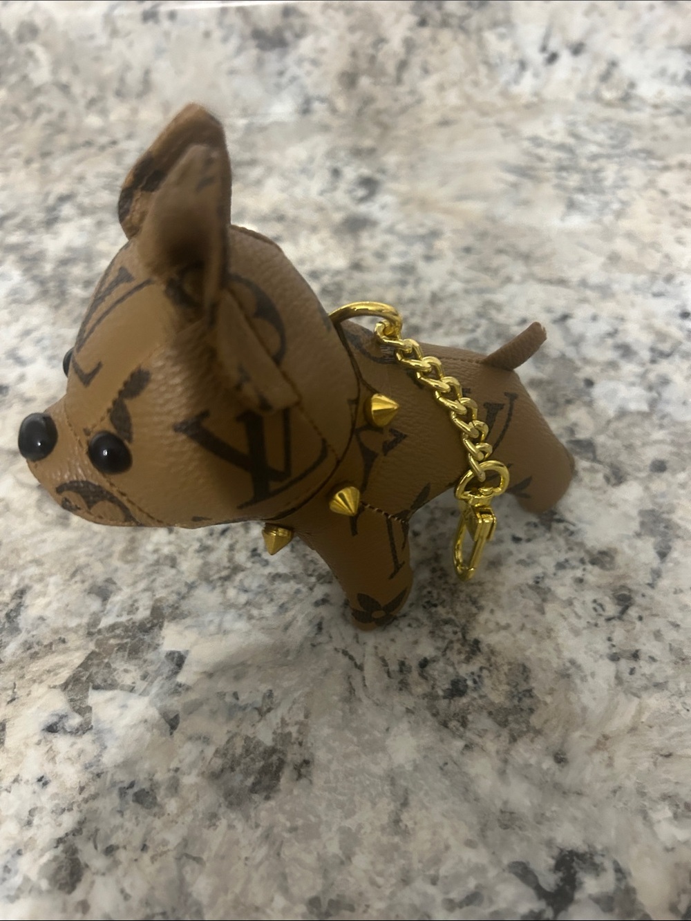 Luxury Monogram Tan Dog Charm Keychain benefits animal rescue.